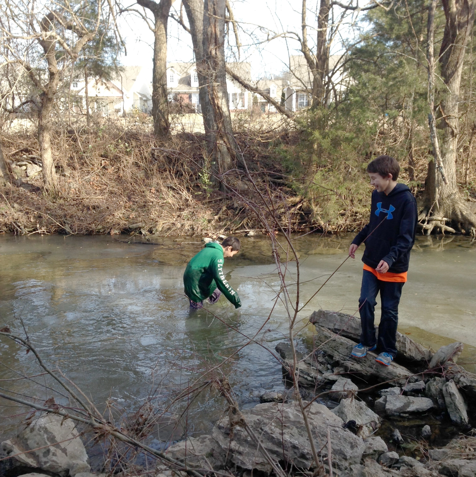  Kendrick (standing) and Keaton (in water) at the creek that runs by our neighborhood. Every time we went, Keaton “accidentally” fell in.